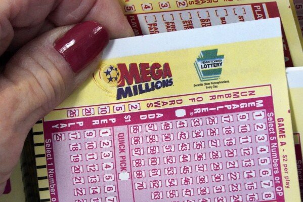 Mega Millions winning numbers for Dec. 27 lottery drawing: Jackpot balloons to $1.22 billion